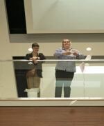 Students protest faculty layoffs during Liberal Arts Symposium on Wednesday