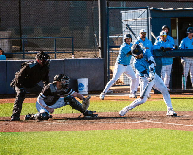 UCO's Carson Taylor gets a hit against the Drury pitcher (Hunter George/ The Vista)