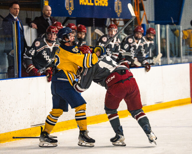 UCO hockey player gets into a fight after a misunderstanding with the OU player. (Hunter George/The Vista) 