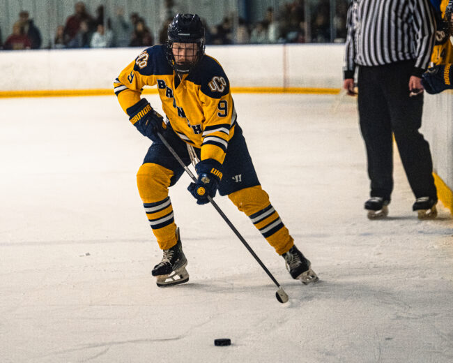 UCO's Matt Russell gains possession of the puck. (Hunter George/The Vista) 