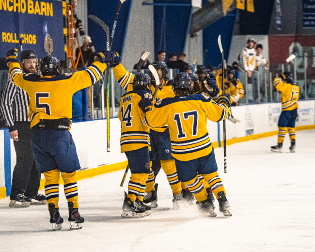 The UCO hockey team celebrates scoring a goal. (Hunter George/The Vista) 