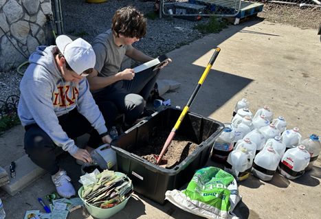 Students filling milk jug greenhouses. Left: Ryne Anders/ Right: James Seabrook (HAWKEL CLEMENS/THE VISTA)