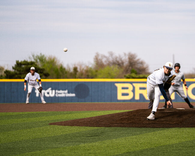 UCO's Danny Satterlee throws a pitch in hopes of getting the Fort Hayes batter out. (Hunter George/ The Vista)