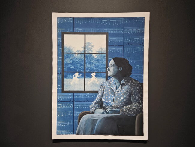 "Traces of Blue" by Lauren Tarter woman sitting in a chair looking out the window where two white figures play outside. (Greyson Boutin/The Vista)
