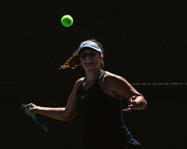 UCO's Karyna Yurchenko tracks the ball and prepares to return the serve. (Hunter George/ The Vista) 
