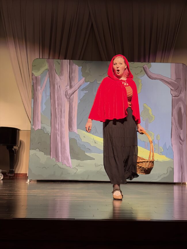 Elliot Hale as Red Riding Hood during rehearsal (Photo provided by Dr. Kevin Gwinn)