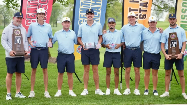 The UCO men's golf team standing with their awards after winning the MIAA championship.