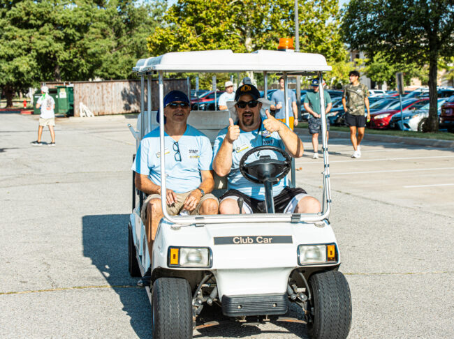 UCO workers are bringing water around to the volunteers. (Drew Rayburn/ The Vista)