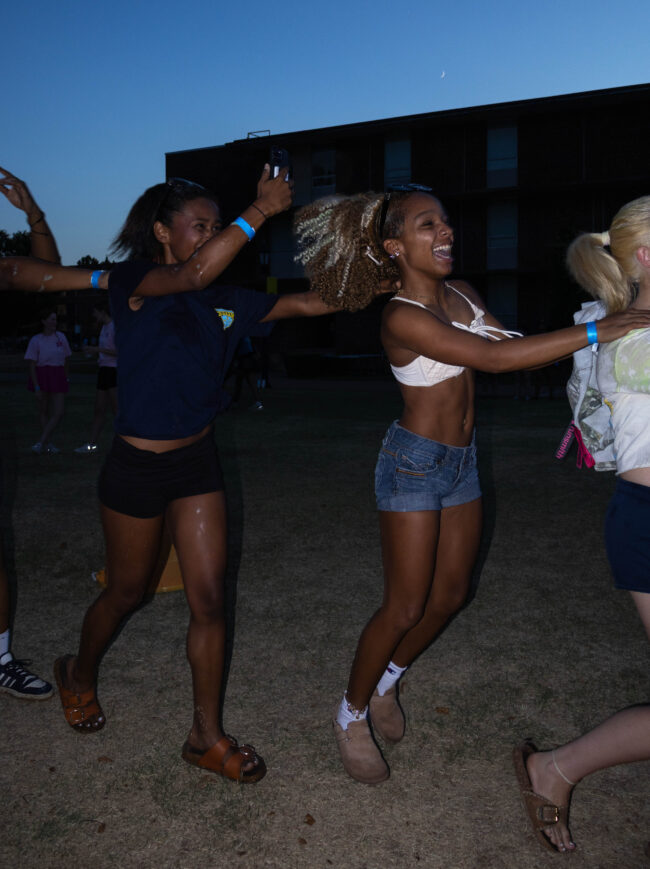 Four students form a conga line. (Maycee Elerick/The Vista)