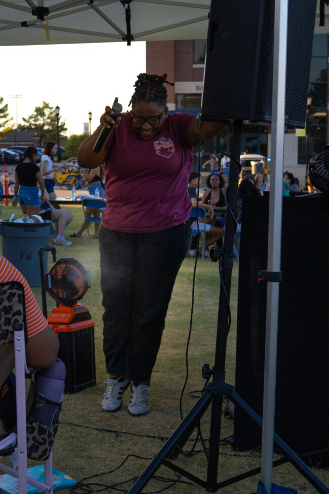 DJ jumping with the music. (Maycee Elerick/The Vista)