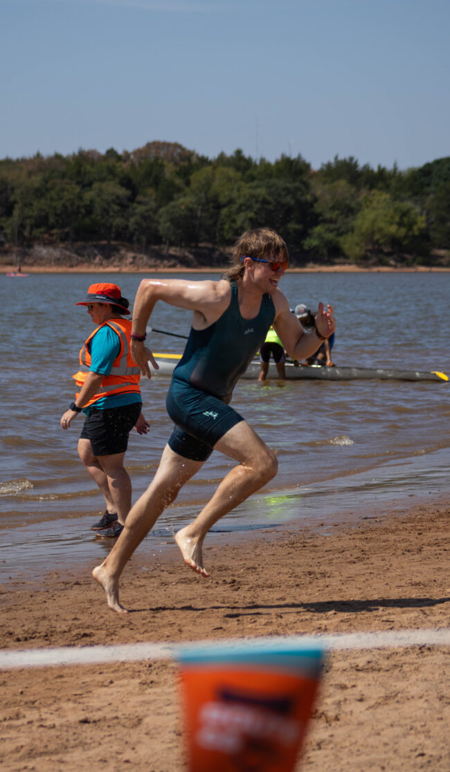 A man sprinting to the finish line. (Maycee Elerick/The Vista)