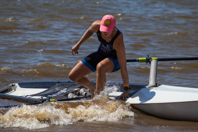 A woman leaves her boat to start her final sprint. (Maycee Elerick/The Vista)