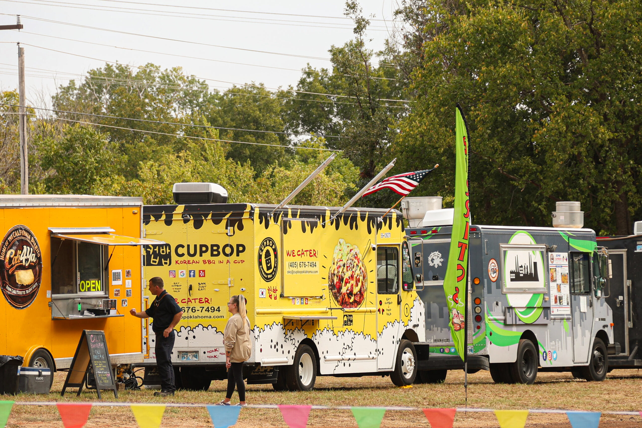 Food trucks line up outside of the entrance. (Emily Lavarn/ The Vista)