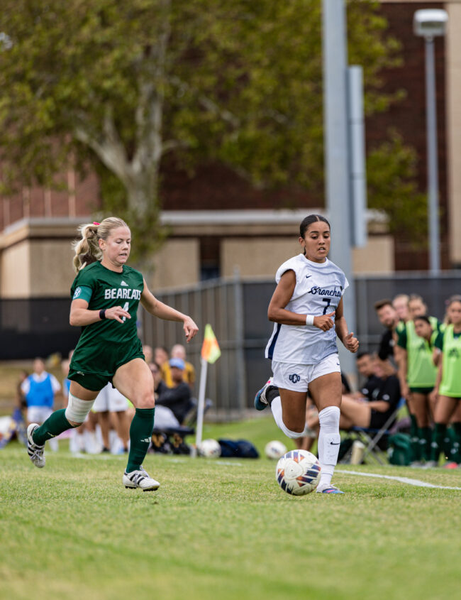 No. 7 beats a Bearcat defender to the ball down the wing. (Drew Rayburn/ The Vista)