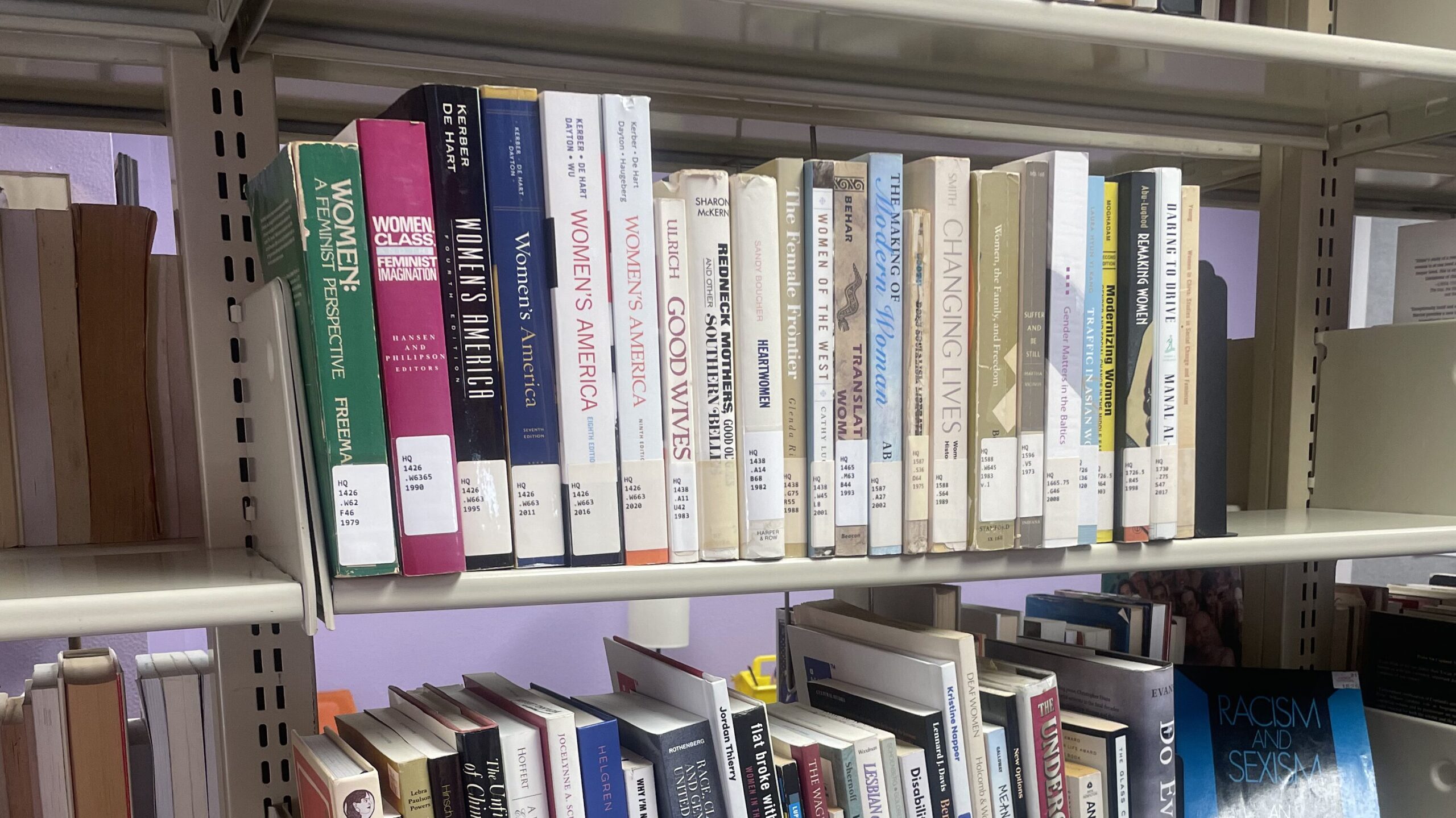 Various works of gender and sexuality are on a large shelf of books at The Center on UCOs campus. 