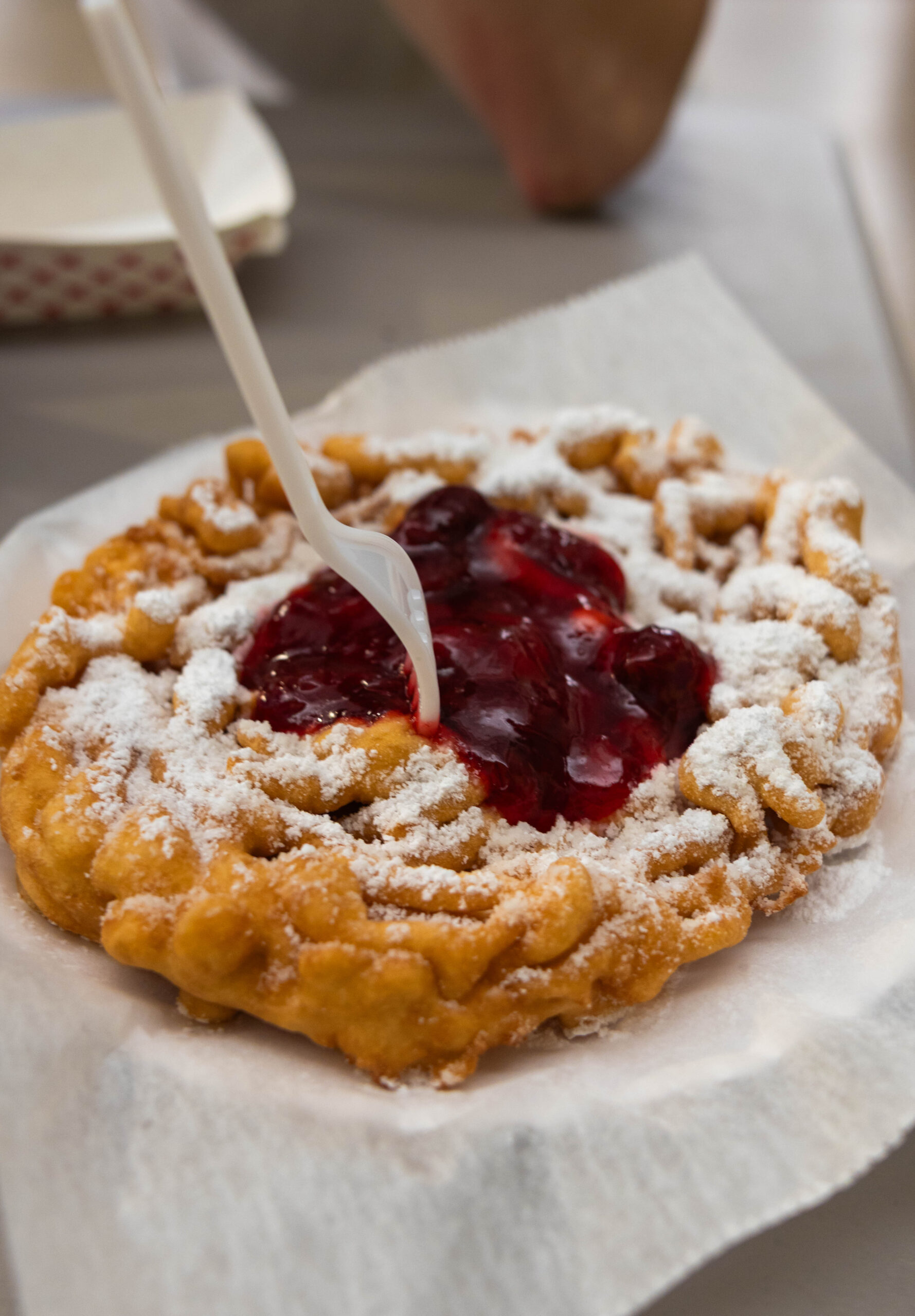 Funnel cake with strawberry (Maycee Elerick/The Vista)