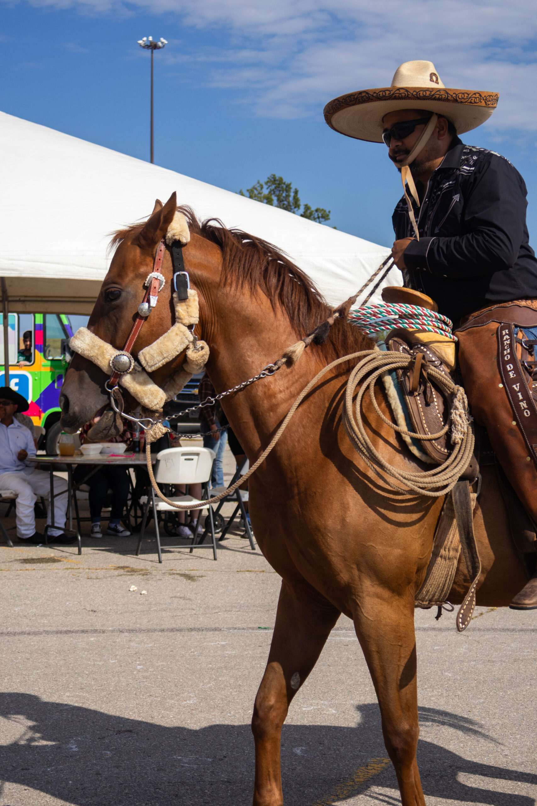 Man horseback riding past spectators.(Maycee Elerick/The Vista)
