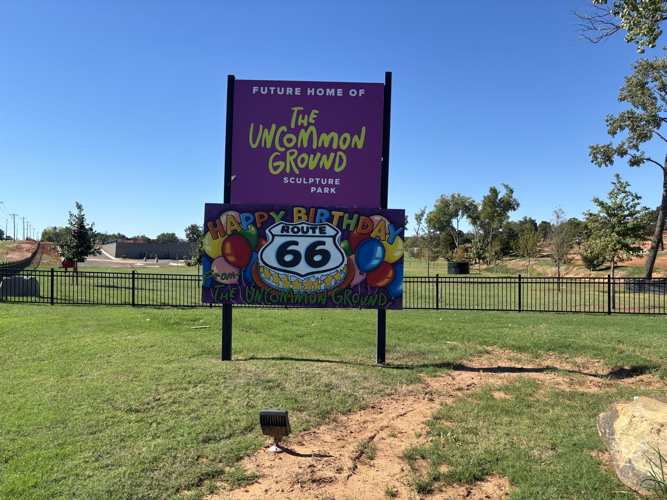 The Uncommon Ground Sign from Route 66. "FUTURE HOME OF THE UNCOMON GROUND SCULPTURE PARK. HAPPY BIRTHDAY ROUTE 66". 